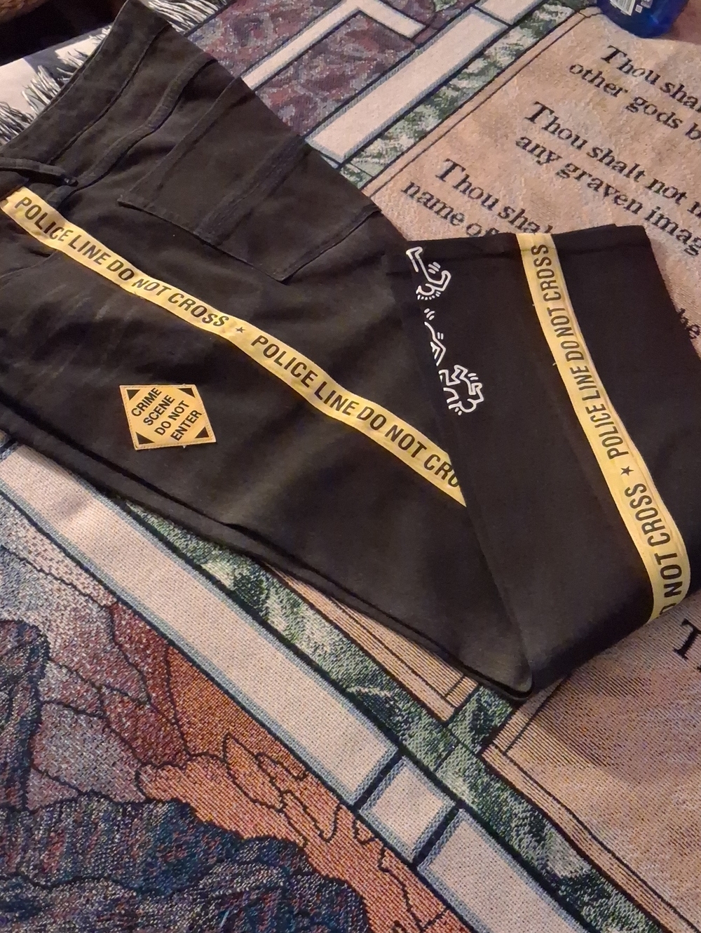 Men's Black Jeans with Yellow 'Police Line Do Not Cross' Tape Accent
